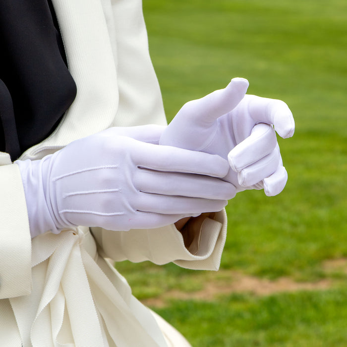 Woman is wearing matt satin gloves in white