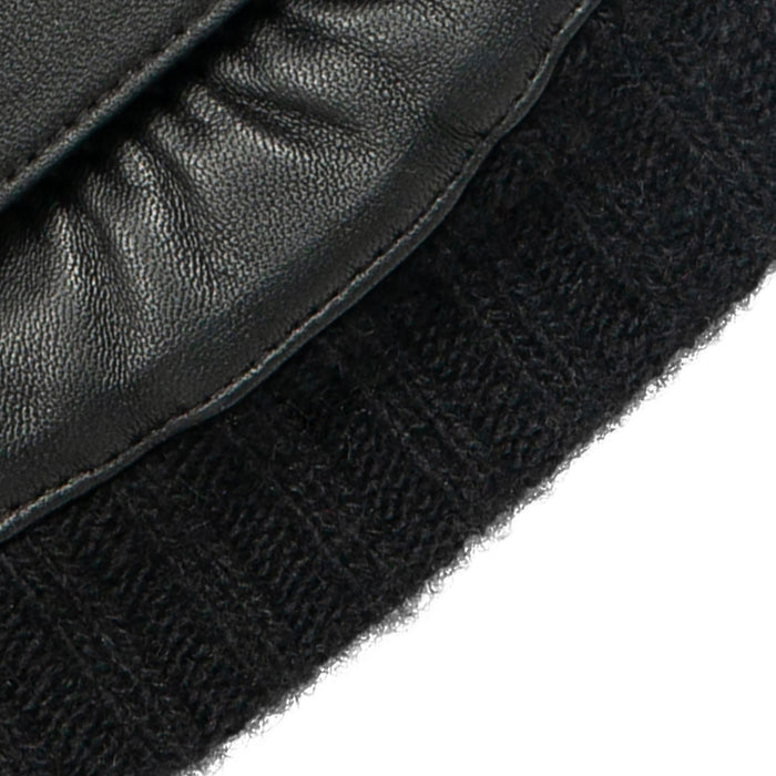 Men's touchscreen cashmere-lined leather gloves in black close up of knitwear