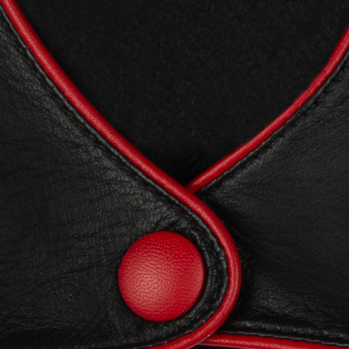 Women's leather driving gloves with heart cut out in black/berry - close up of the red button