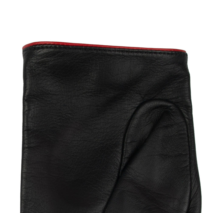 Women's leather driving gloves with heart cut out in black/berry - close up of the cuff