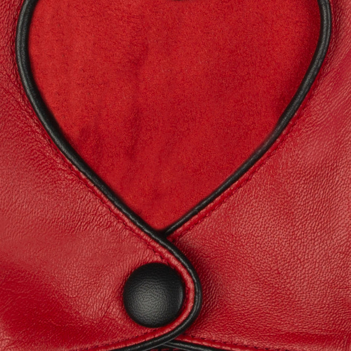 Women's leather driving gloves with heart cut out in berry/black - close up of the button