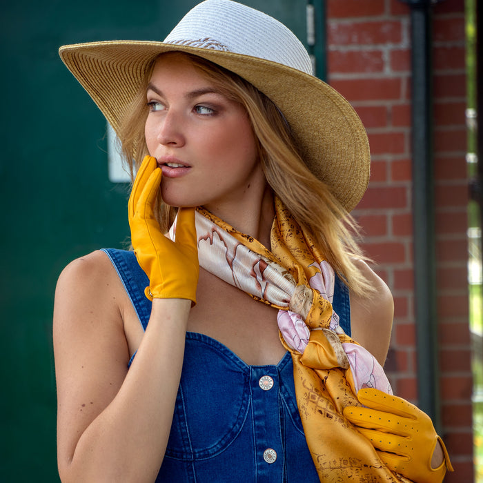 Woman wearing Women's Lined Leather Driving Gloves Yellow