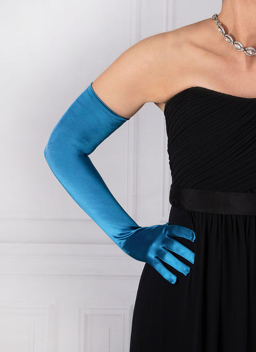 Woman wearing teal blue opera satin gloves with an evening dress